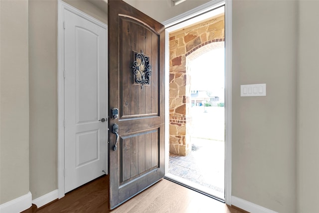 foyer with hardwood / wood-style flooring