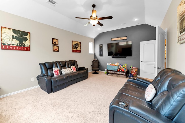 carpeted living room with ceiling fan and lofted ceiling