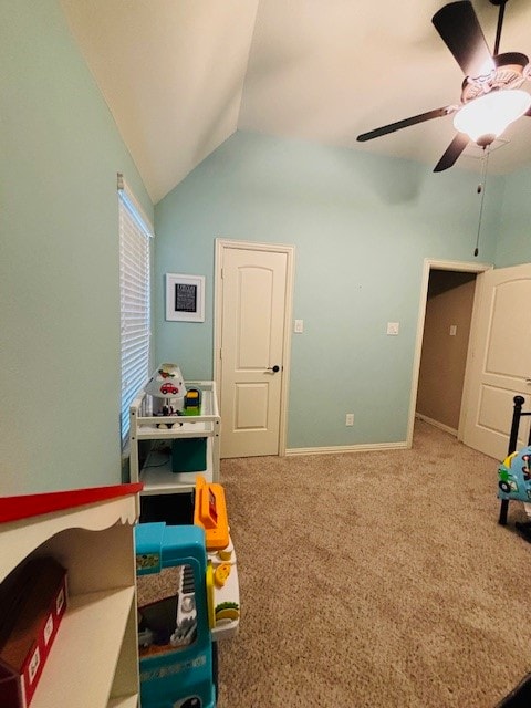 game room featuring ceiling fan, carpet floors, and lofted ceiling