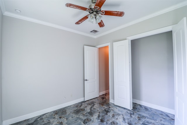 unfurnished bedroom featuring ceiling fan and crown molding