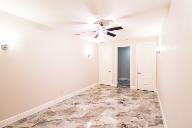 spare room featuring ceiling fan