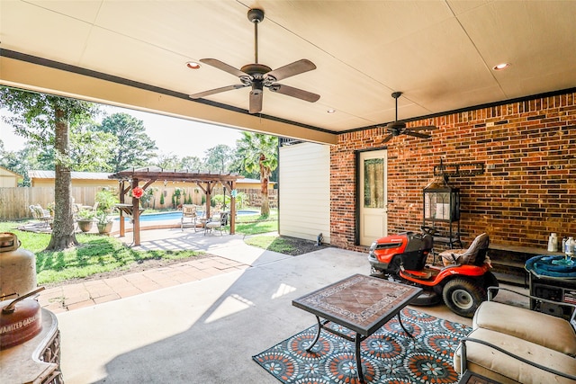 view of patio featuring a pergola and ceiling fan