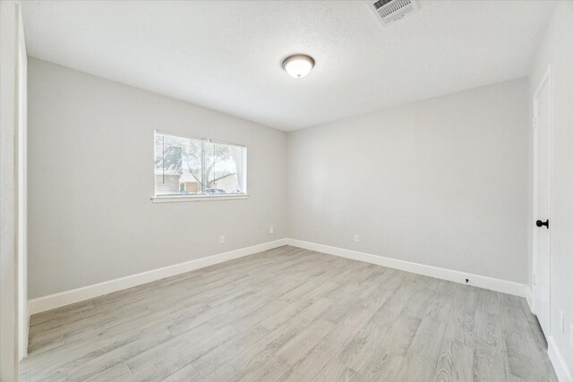 empty room featuring light hardwood / wood-style flooring