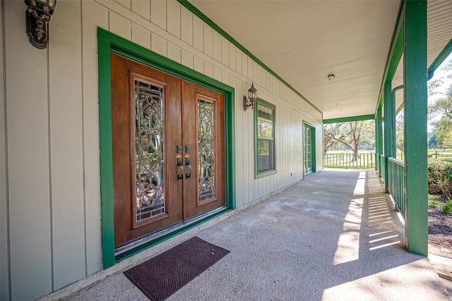 entrance to property with covered porch