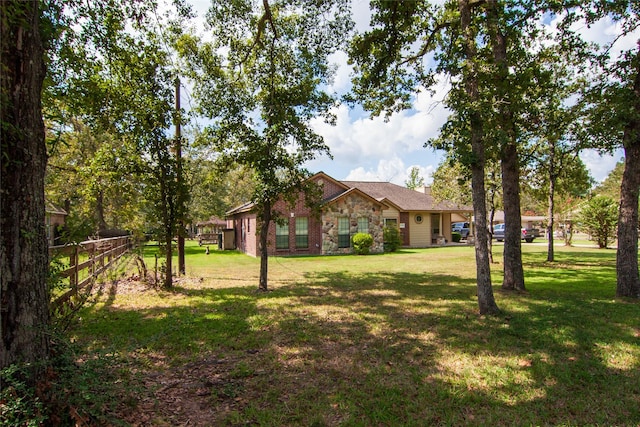 view of yard with fence