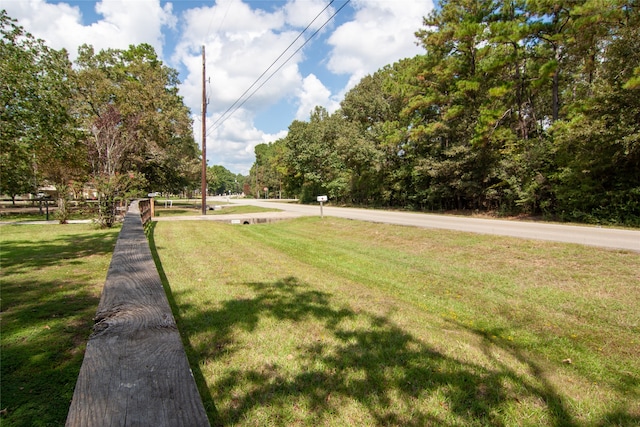 view of community featuring a lawn