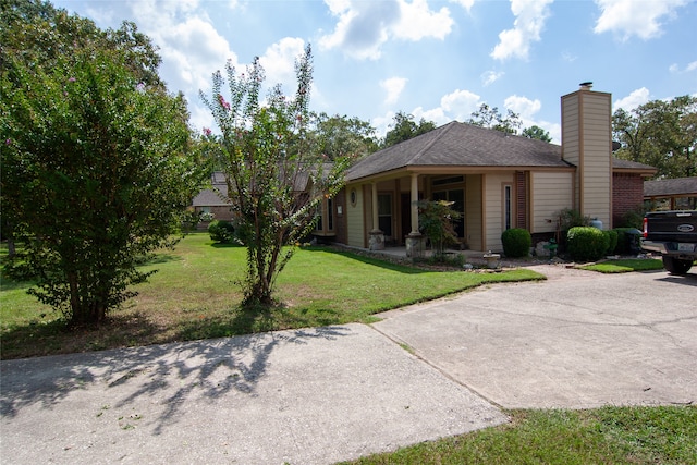 exterior space featuring a front yard