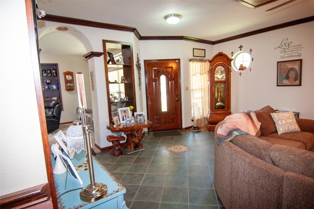 living room with ornamental molding and dark tile patterned flooring