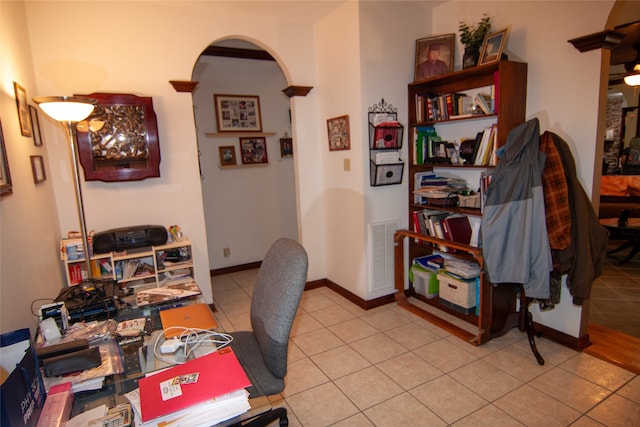 home office featuring light tile patterned floors