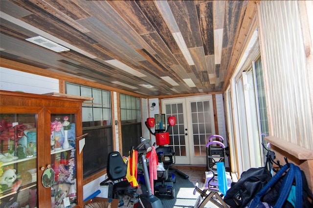 misc room with french doors and wood ceiling