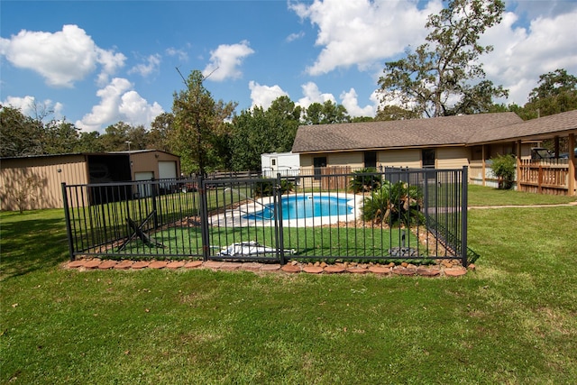 view of pool with an outdoor structure, a yard, a fenced in pool, and fence