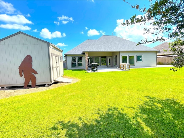 308 Creekside Ln, Lake Jackson, TX 77566 - rear view of property with a patio and a shingled roof