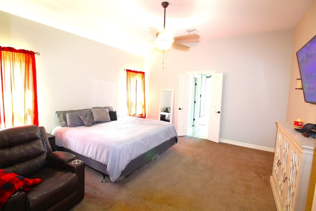 bedroom with ceiling fan and carpet flooring