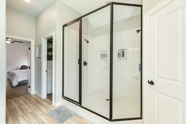 308 Creekside Ln, Lake Jackson, TX 77566 - bathroom featuring a stall shower, ensuite bathroom, and ceiling fan