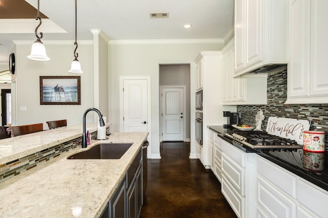 308 Creekside Ln, Lake Jackson, TX 77566 - kitchen featuring a sink, tasteful backsplash, white cabinets, light stone counters, and concrete flooring
