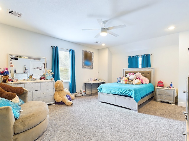 bedroom with ceiling fan and carpet flooring