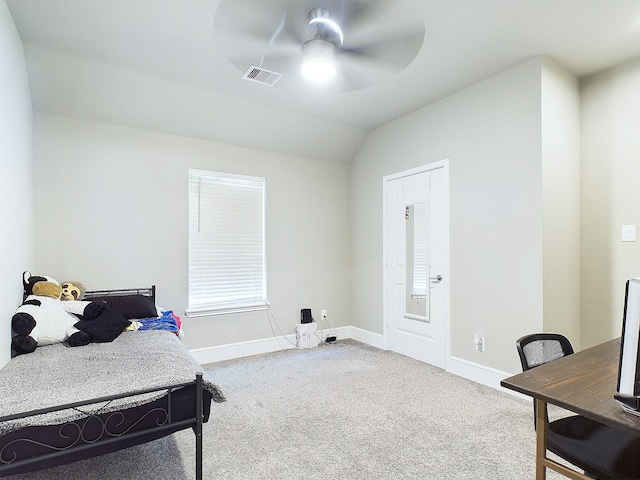 bedroom featuring carpet, lofted ceiling, and ceiling fan