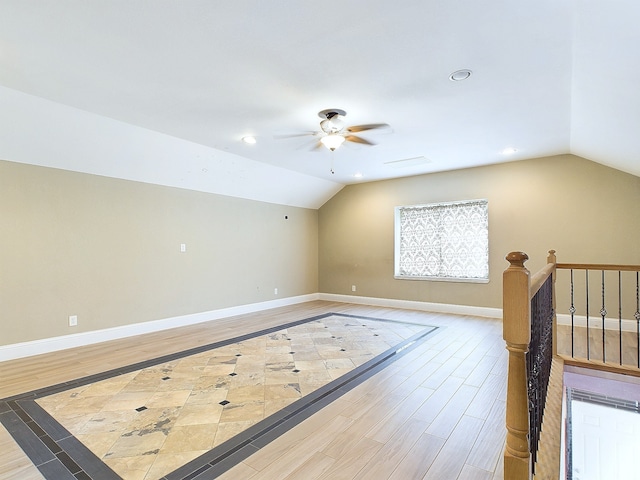 bonus room with lofted ceiling, ceiling fan, and hardwood / wood-style flooring