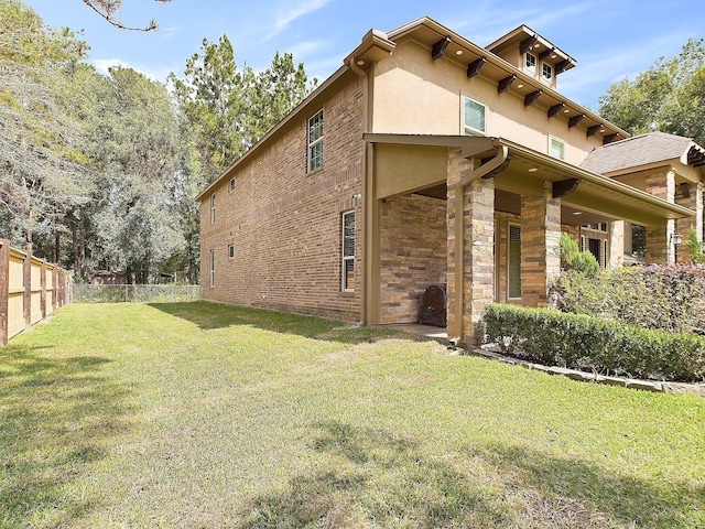 view of property exterior featuring a yard