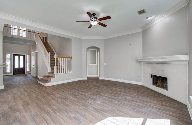 unfurnished living room featuring crown molding, ceiling fan, and hardwood / wood-style flooring