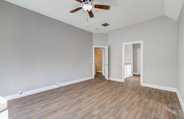 unfurnished bedroom featuring lofted ceiling, ceiling fan, and hardwood / wood-style floors