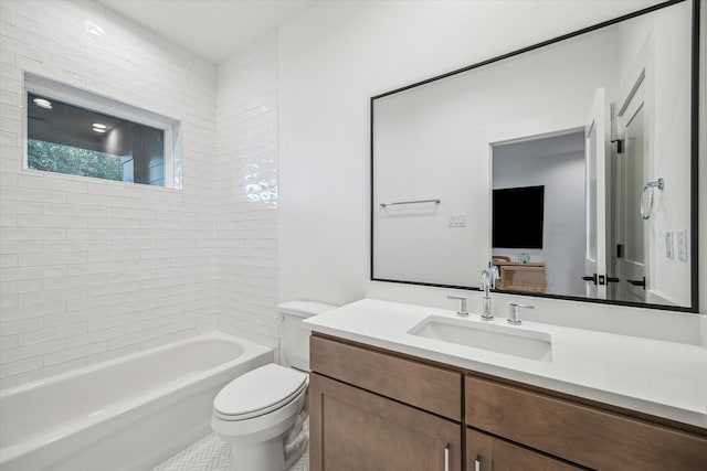 full bathroom with vanity, toilet, and tiled shower / bath combo