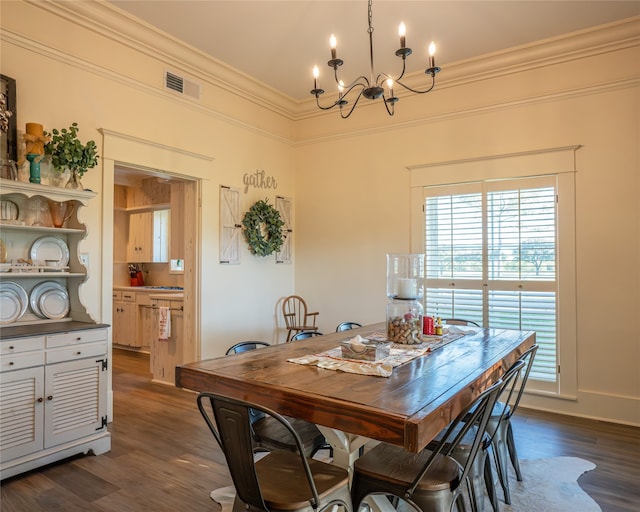 dining space with a chandelier, crown molding, and dark wood-type flooring