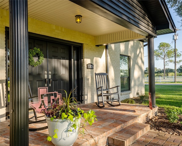 entrance to property with a porch