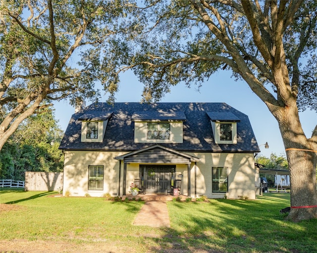 view of front of home with a front yard