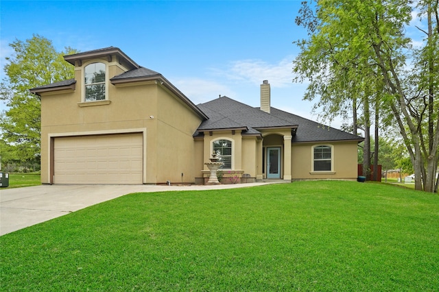 view of front facade featuring a garage and a front lawn