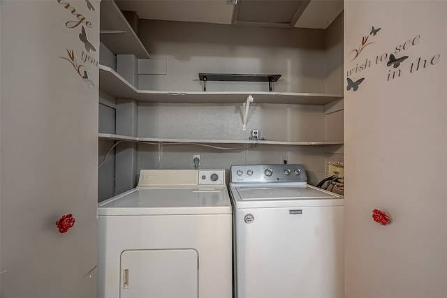 washroom with washer and clothes dryer