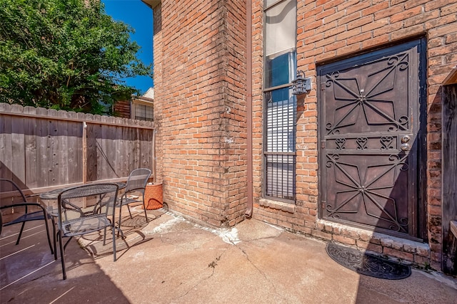 doorway to property featuring a patio area