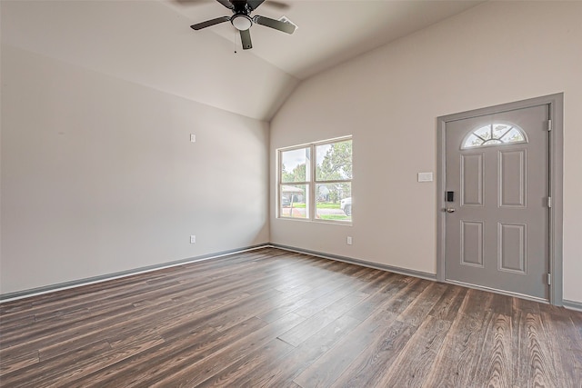 entrance foyer featuring ceiling fan, vaulted ceiling, and dark wood-type flooring