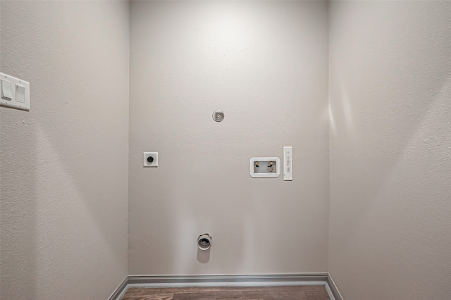 clothes washing area featuring washer hookup, gas dryer hookup, and hookup for an electric dryer