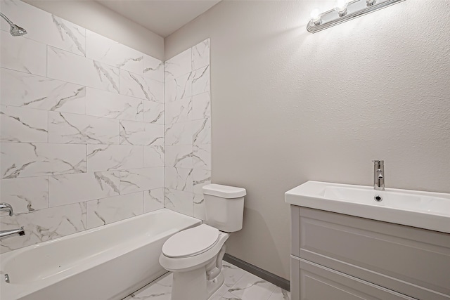 full bathroom with vanity, toilet, and tiled shower / bath