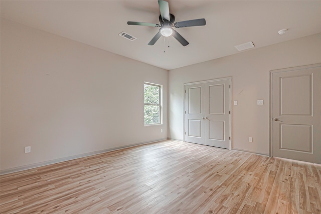 unfurnished bedroom featuring light hardwood / wood-style floors and ceiling fan