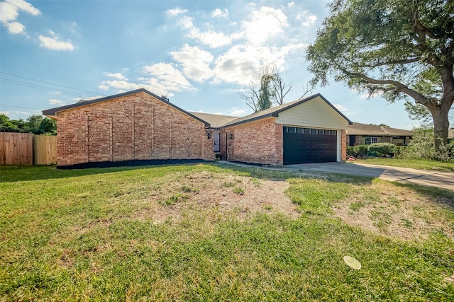 single story home featuring a front yard and a garage