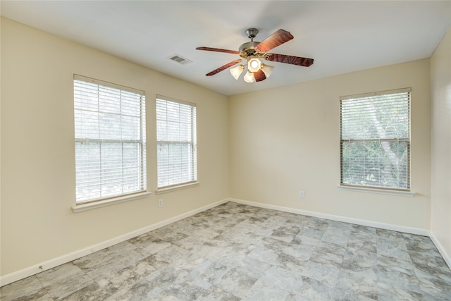 spare room featuring ceiling fan