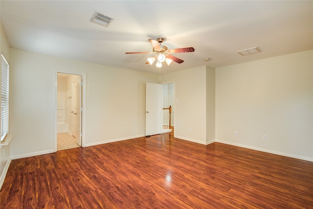 empty room with wood-type flooring and ceiling fan