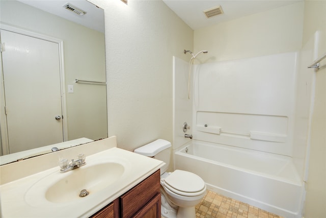 full bathroom with bathtub / shower combination, vanity, and toilet