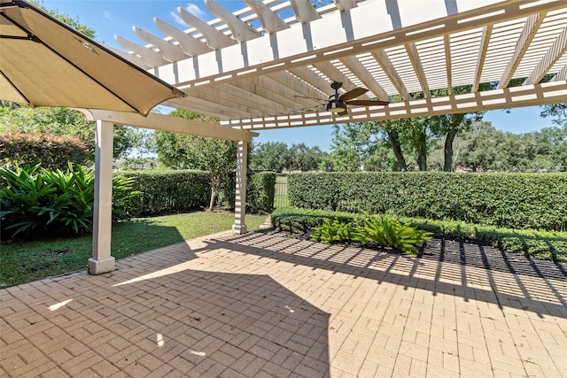 view of patio featuring ceiling fan, a fenced backyard, and a pergola