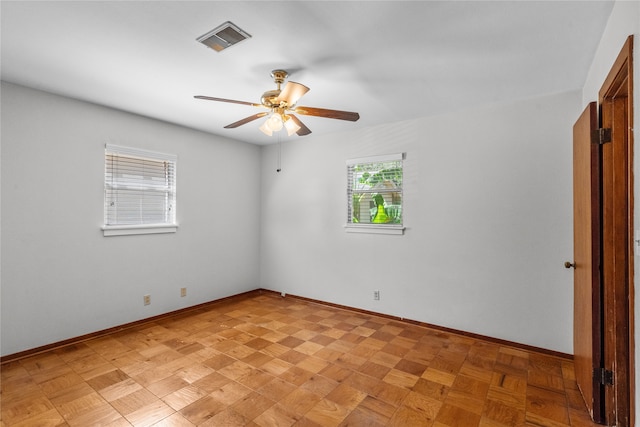 spare room featuring ceiling fan