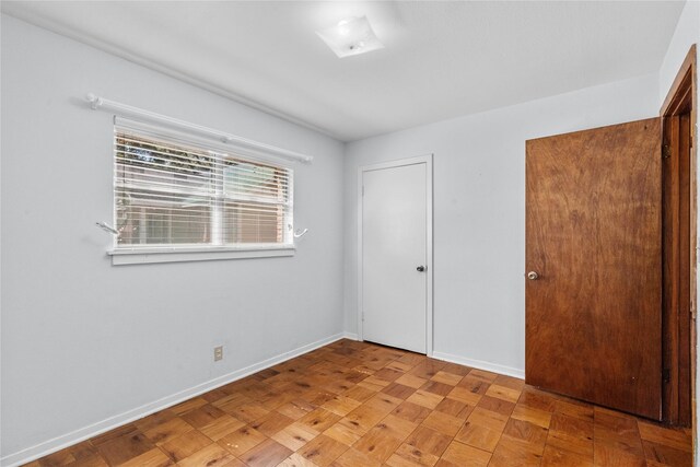 unfurnished bedroom featuring a closet