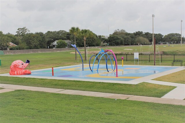 view of jungle gym with a yard