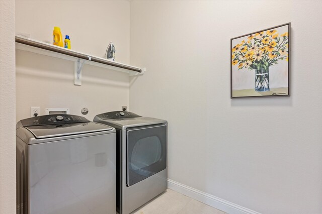 laundry area featuring washing machine and dryer