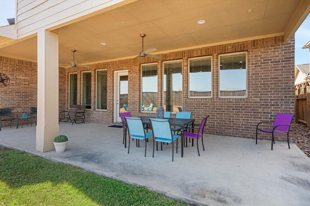 view of patio featuring ceiling fan