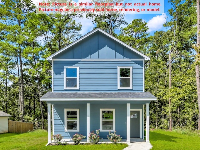 view of front of property with a front lawn and a porch