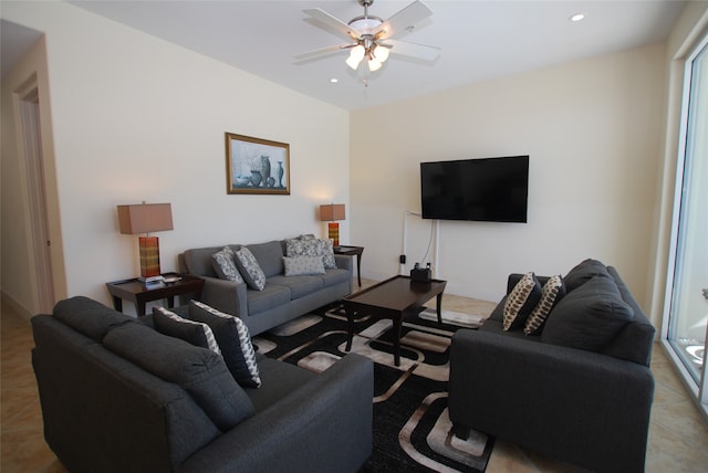 tiled living room with ceiling fan