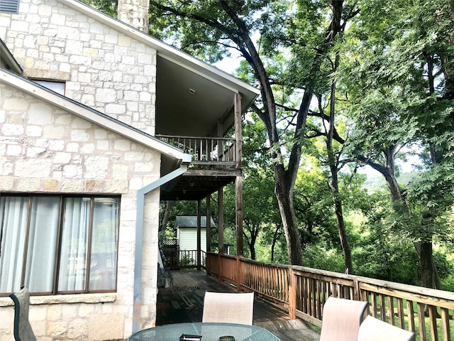 view of property exterior featuring a deck