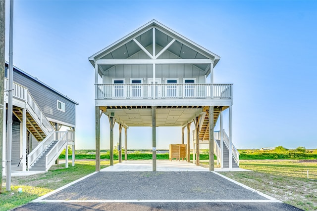 view of vehicle parking with a carport